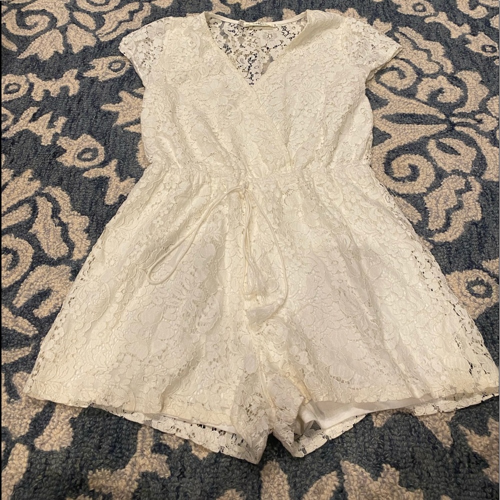 Available by Angela Fashion white floral romper in size S